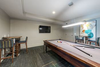 Billiards room at the tribute apartments in raleigh, nc 27612